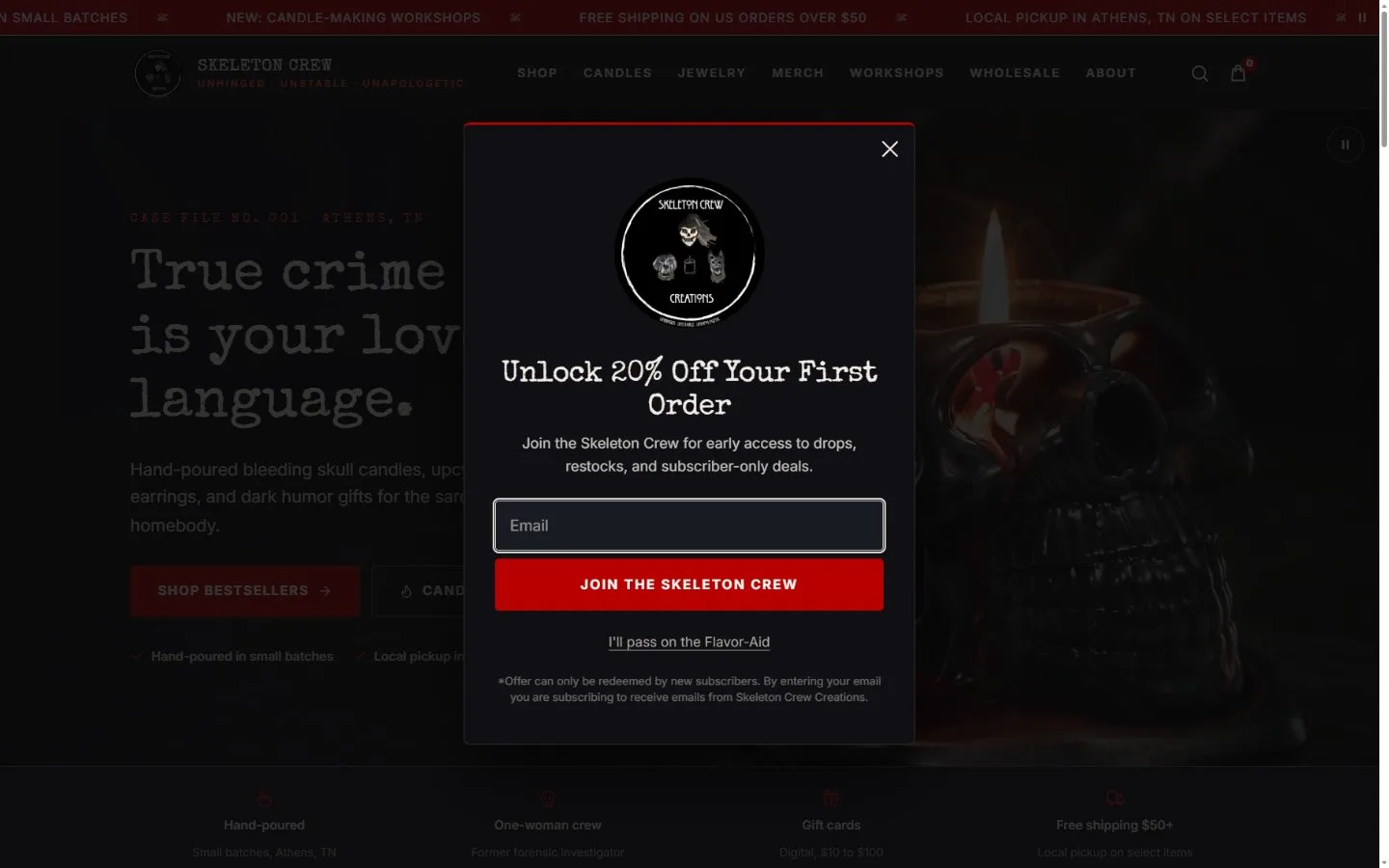 Email popup, signup modal in context, new site, desktop view. A dark card that matches the site behind it.