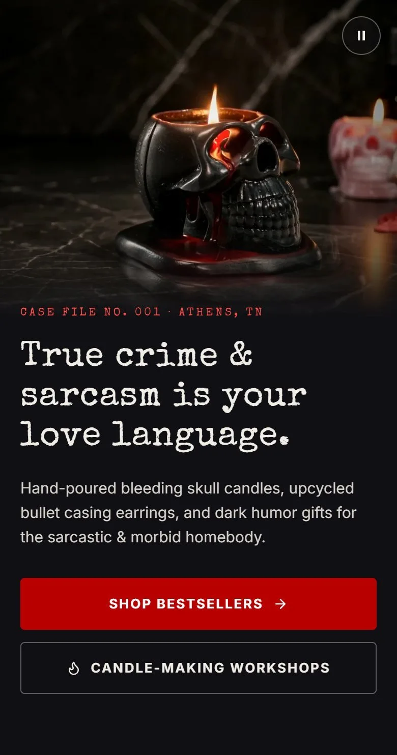 Home, hero video at about 7 seconds, new site, phone view. The lineup shot: a pink skull candle enters at the right edge beside the black skull.