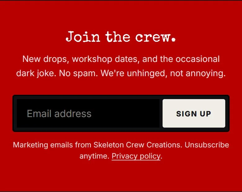 Home, newsletter signup, new site, phone view. A red 'Join the crew.' band with a one-line promise, a labeled field, a Sign up button and a consent line linking the privacy policy.