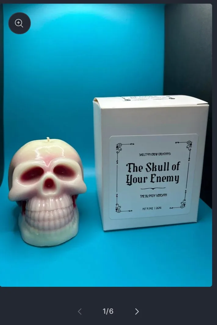 Product page: bleeding skull candle, gallery, old site, phone view. Six photos stacked in a grid 2,781 px tall.