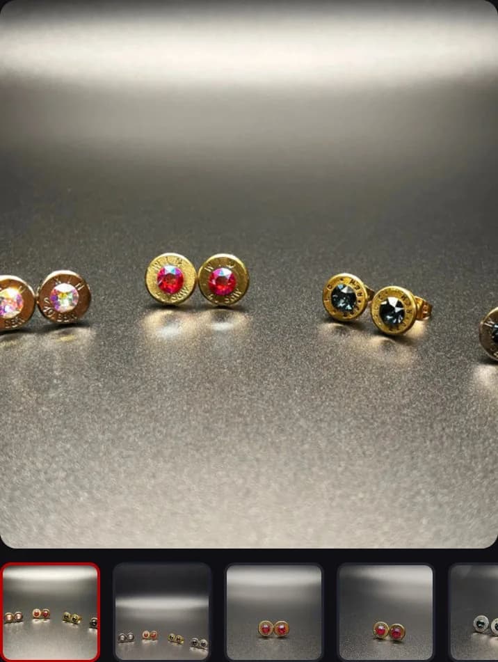 Product page: bullet casing earrings, gallery, new site, phone view. A main photo with a thumbnail row.