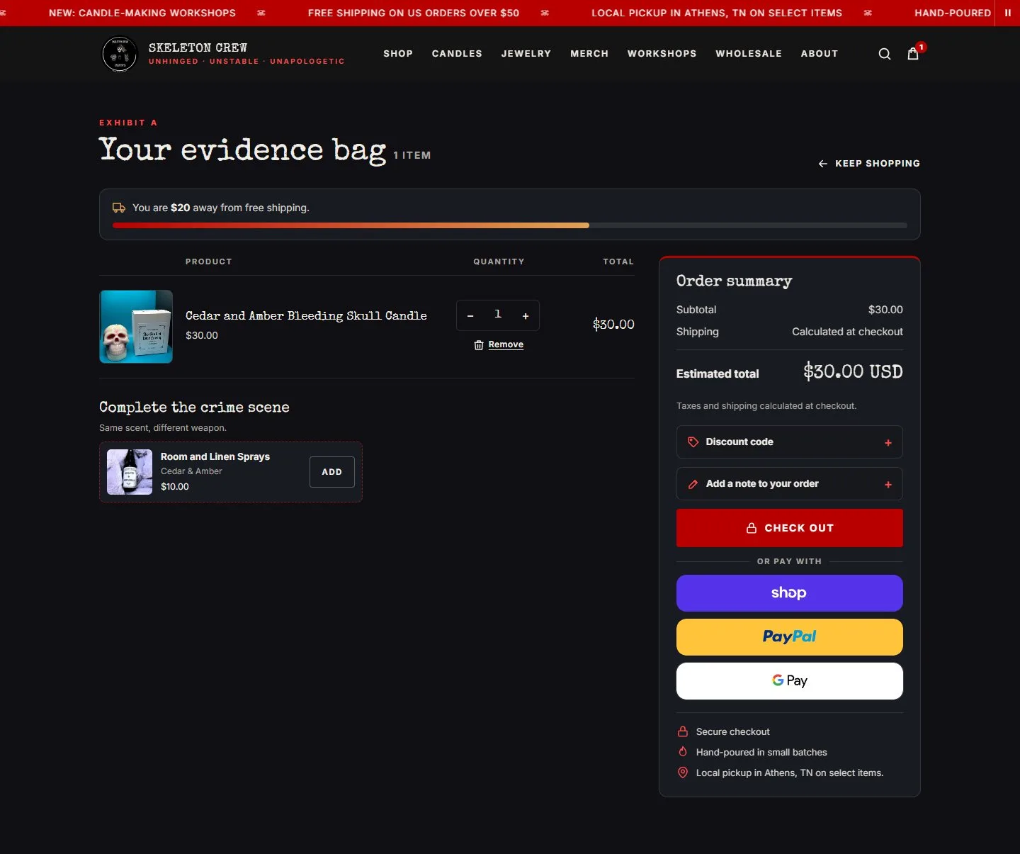 Cart, cart page, new site, desktop view. 'Exhibit A / Your evidence bag' with the free-shipping bar, the same scent-matched add-on, and an Order summary panel: subtotal, shipping, discount code, order note, CHECK OUT, express buttons and three trust.
